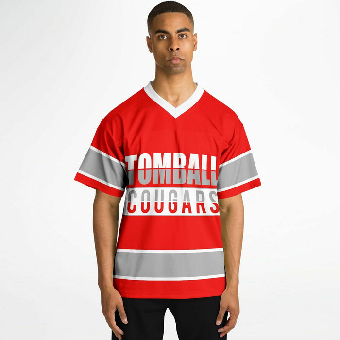 Black man wearing Tomball Cougars High School football Jersey