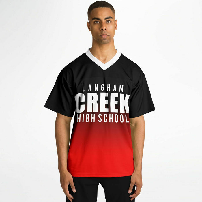 Black man wearing Langham Creek Lobos football Jersey