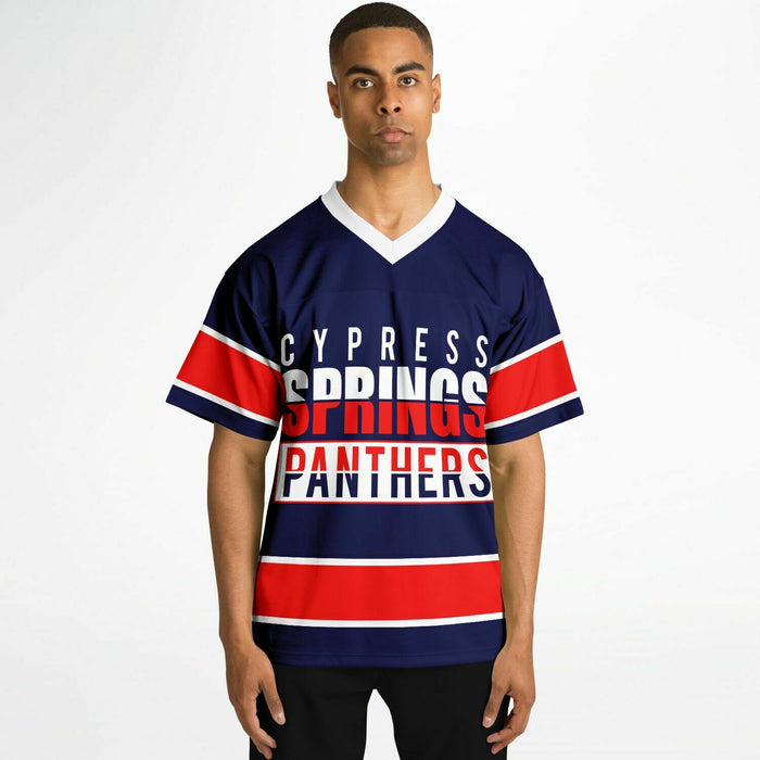 Black man wearing Cypress Springs Panthers football Jersey