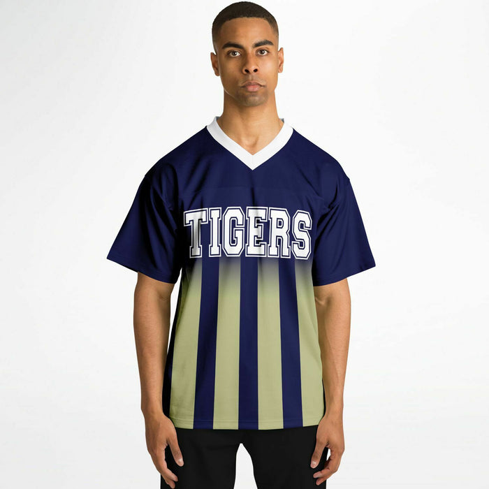 Black man wearing Klein Collins Tigers football Jersey 14