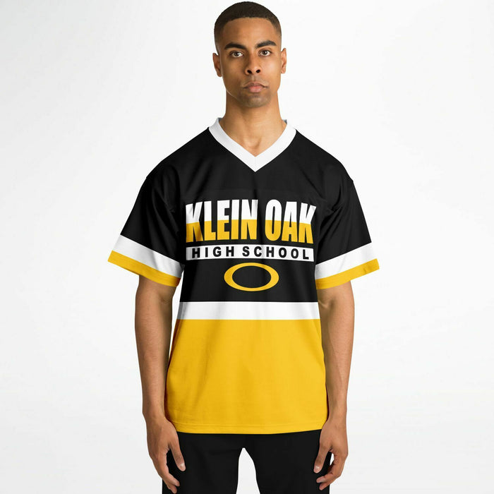 Black man wearing Klein Oak Panthers football Jersey