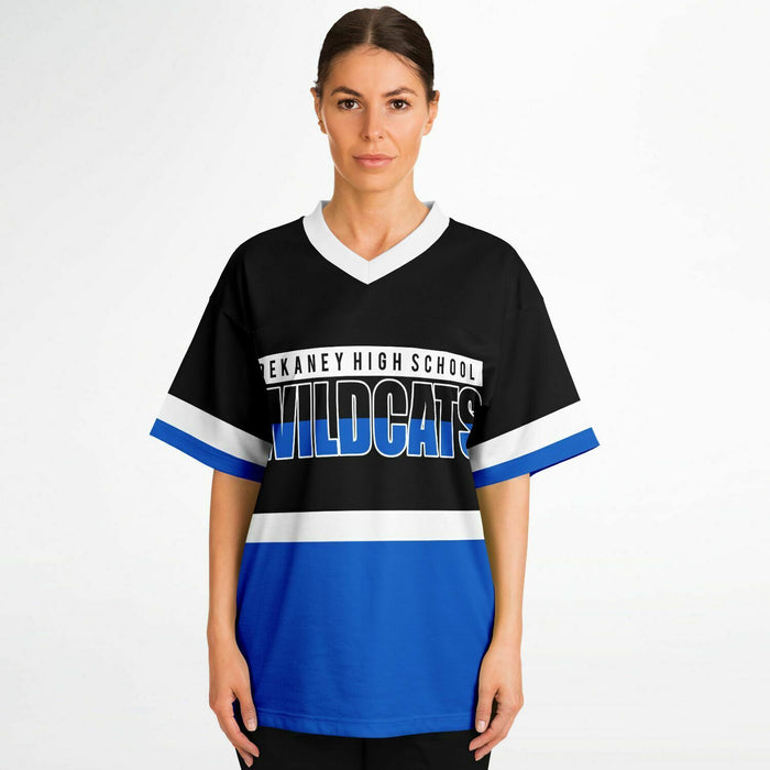 Women wearing Dekaney Wildcats football jersey