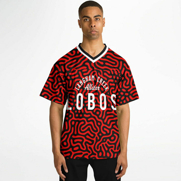 Black man wearing Langham Creek Lobos football Jersey