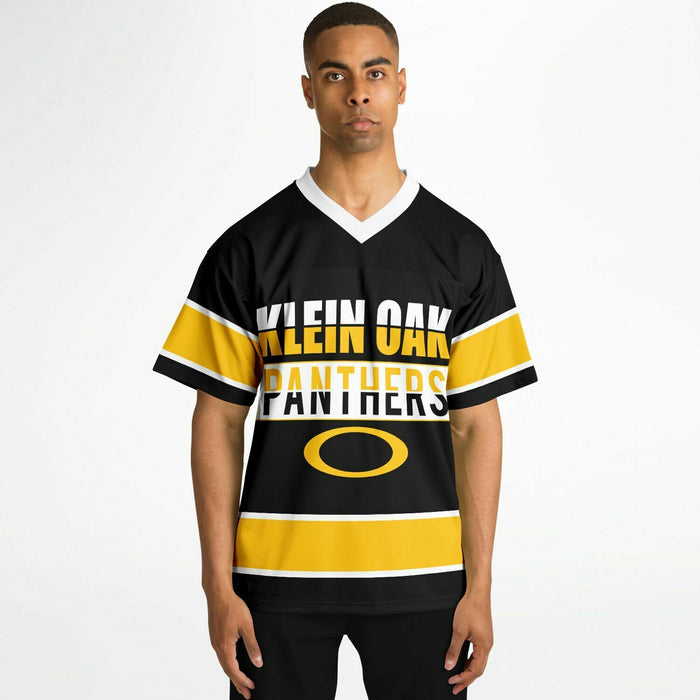 Black man wearing Klein Oak Panthers football Jersey