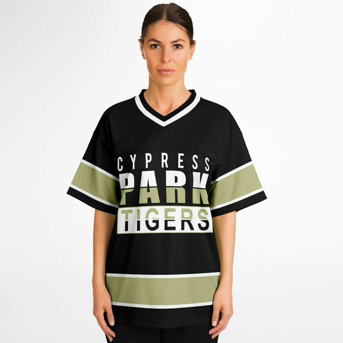 Women wearing Cypress Park Tigers football jersey 13