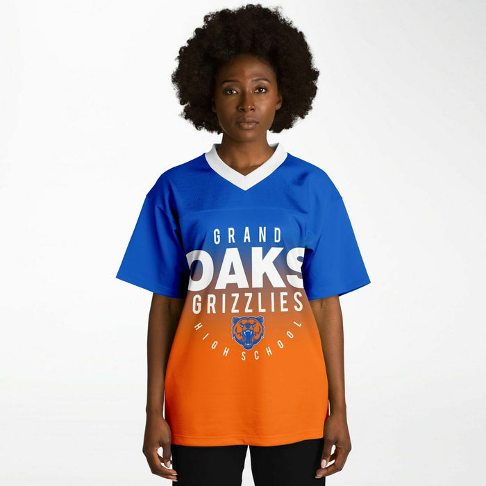 Black woman wearing Grand Oaks Grizzlies football Jersey