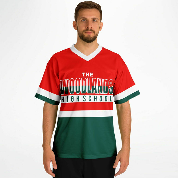 Man wearing The Woodlands Highlanders High School football jersey