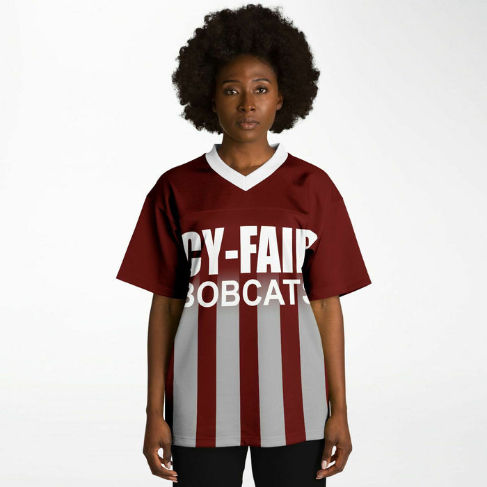 Black woman wearing Cy-Fair Bobcats football Jersey