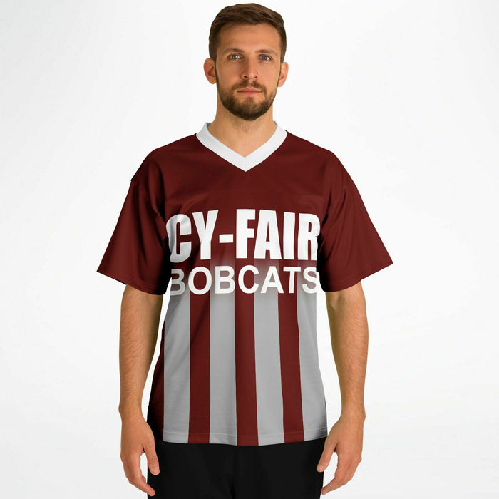 Man wearing Cy-Fair Bobcats football jersey