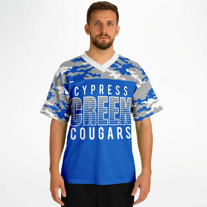 Man wearing Cypress Creek Cougars football jersey