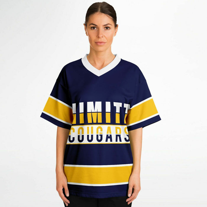 Women wearing Nimitz Cougars High School football jersey
