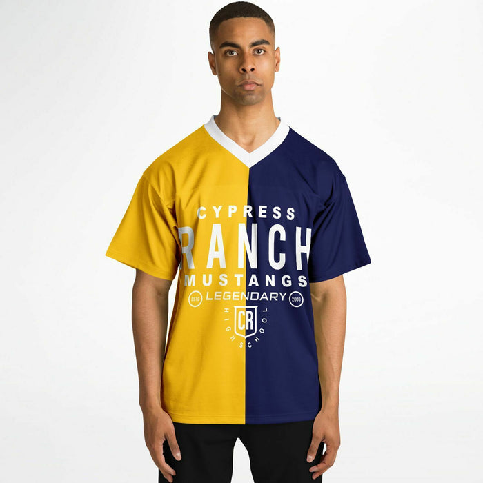 Black man wearing Cypress Ranch Mustangs football Jersey
