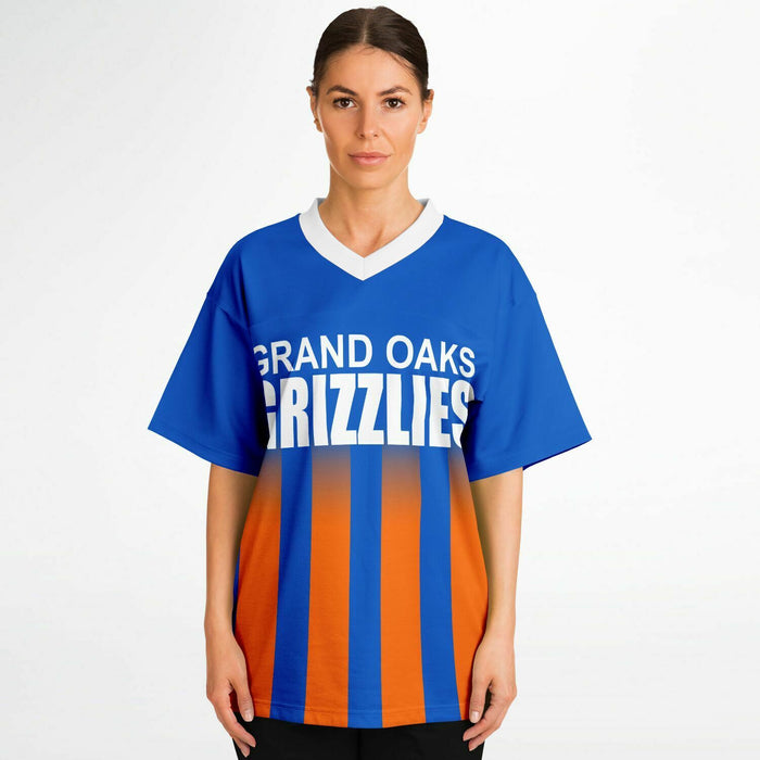 Women wearing Grand Oaks Grizzlies football jersey