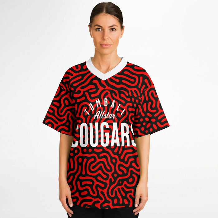 Women wearing Tomball Cougars High School football jersey