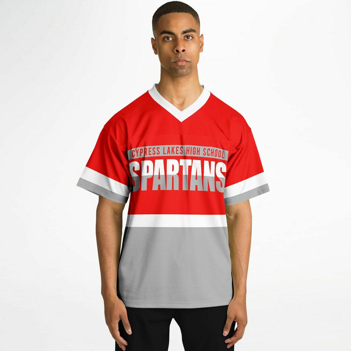 Black man wearing Cypress Lakes Spartans football Jersey