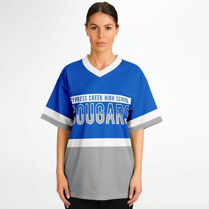 Women wearing Cypress Creek Cougars football jersey