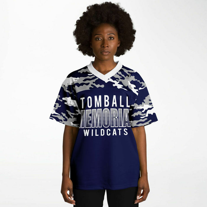 Black woman wearing Tomball Memorial Wildcats High School football Jersey