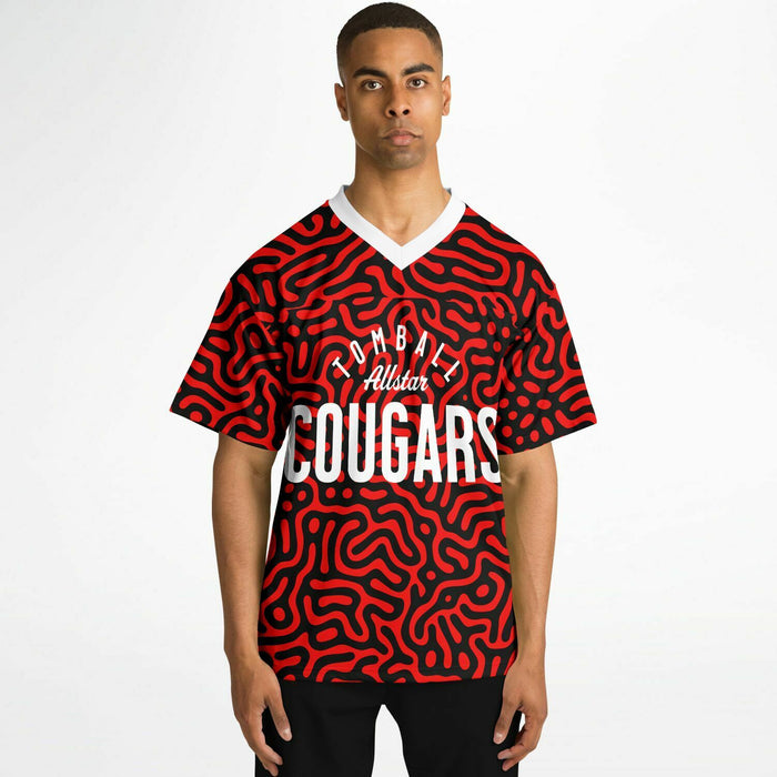 Black man wearing Tomball Cougars High School football Jersey