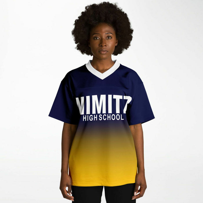 Black woman wearing Nimitz Cougars High School football Jersey