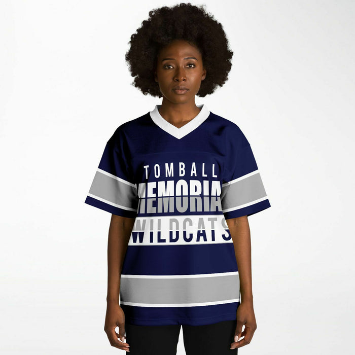 Black woman wearing Tomball Memorial Wildcats High School football Jersey