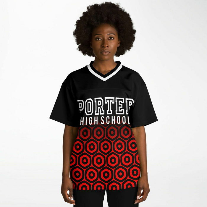 Black woman wearing Porter Spartans High School football Jersey