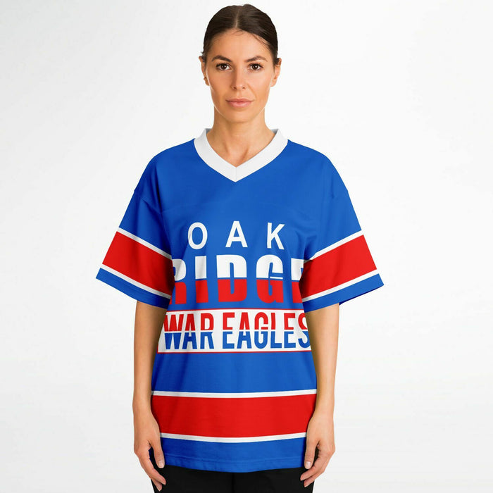 Women wearing Oak Ridge War Eagles High School football jersey