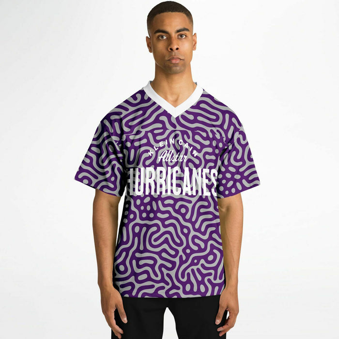 Black man wearing Klein Cain Hurricanes football Jersey