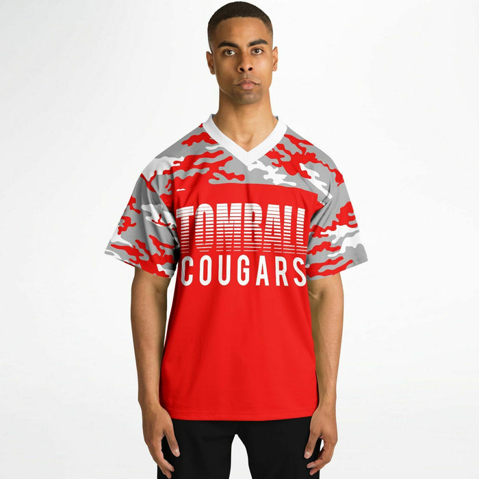 Black man wearing Tomball Cougars High School football Jersey