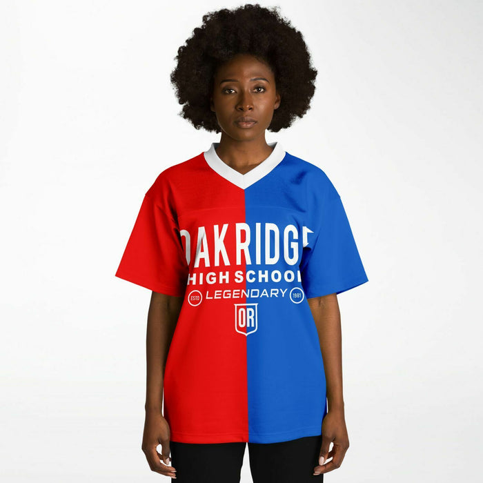 Black woman wearing Oak Ridge War Eagles High School football Jersey