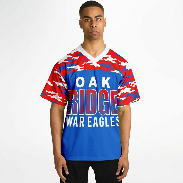 Black man wearing Oak Ridge War Eagles High School football Jersey