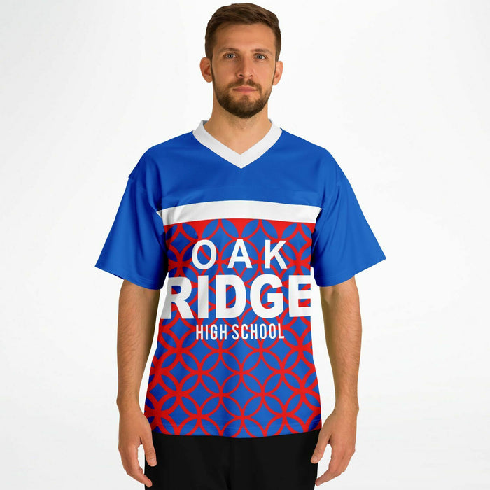 Man wearing Oak Ridge War Eagles High School football jersey