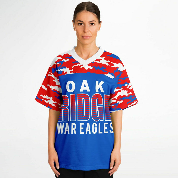 Women wearing Oak Ridge War Eagles High School football jersey