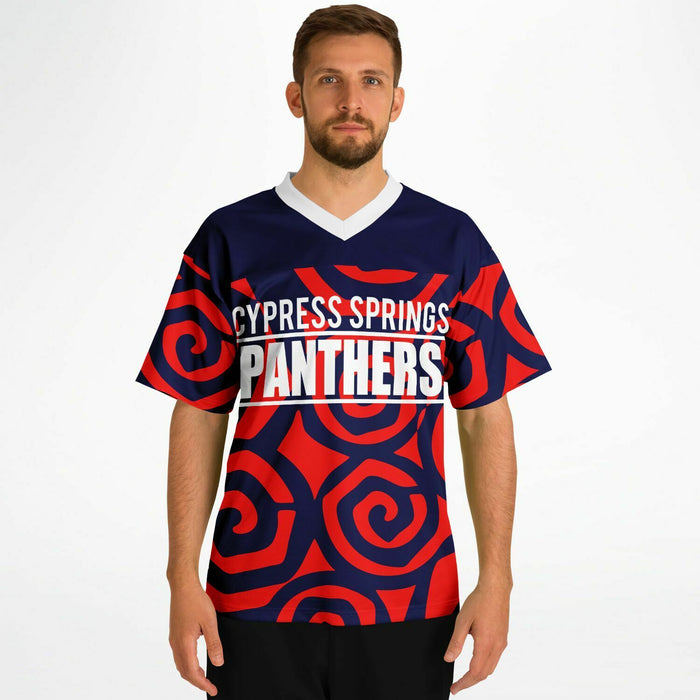 Man wearing Cypress Springs Panthers football jersey