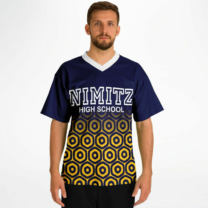 Man wearing Nimitz Cougars High School football jersey