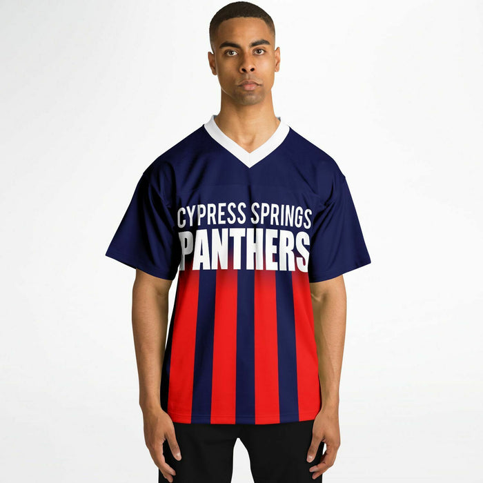 Black man wearing Cypress Springs Panthers football Jersey
