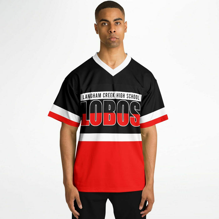 Black man wearing Langham Creek Lobos football Jersey