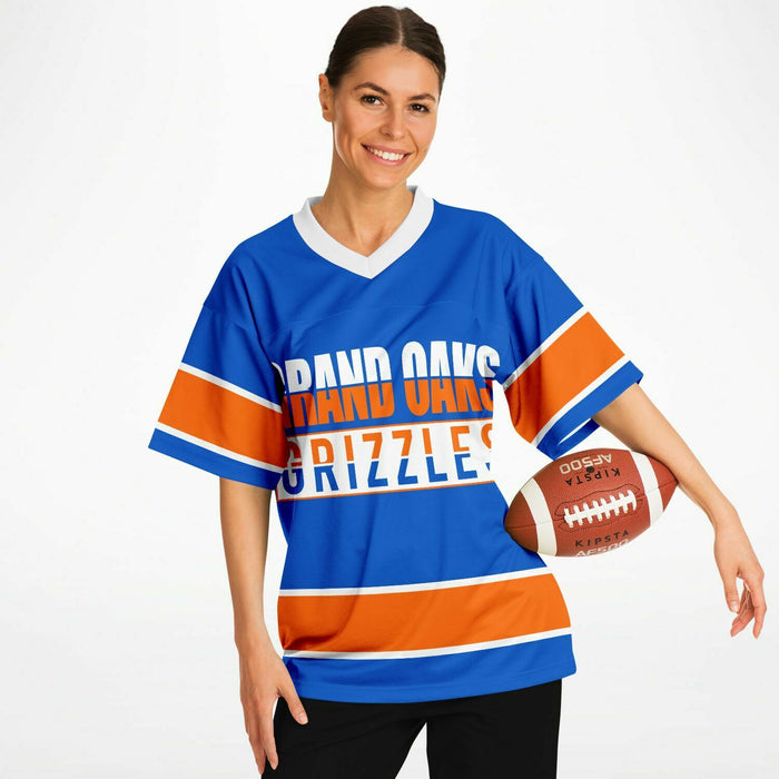 Woman wearing Grand Oaks Grizzlies football jersey