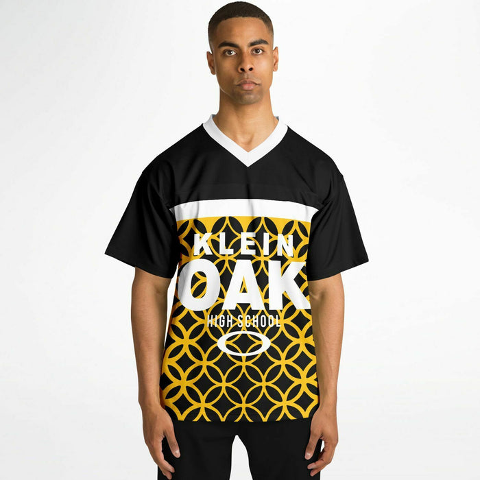 Black man wearing Klein Oak Panthers football Jersey