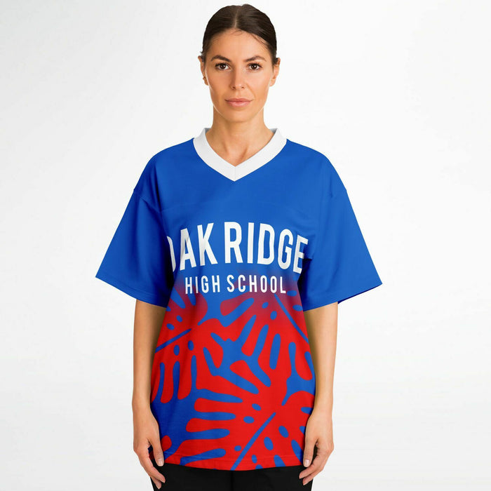 Women wearing Oak Ridge War Eagles High School football jersey