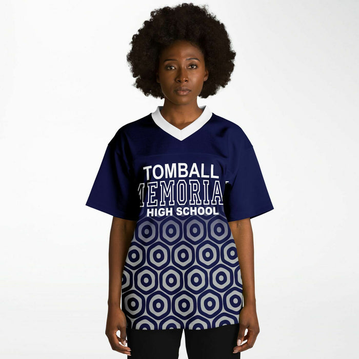 Black woman wearing Tomball Memorial Wildcats High School football Jersey