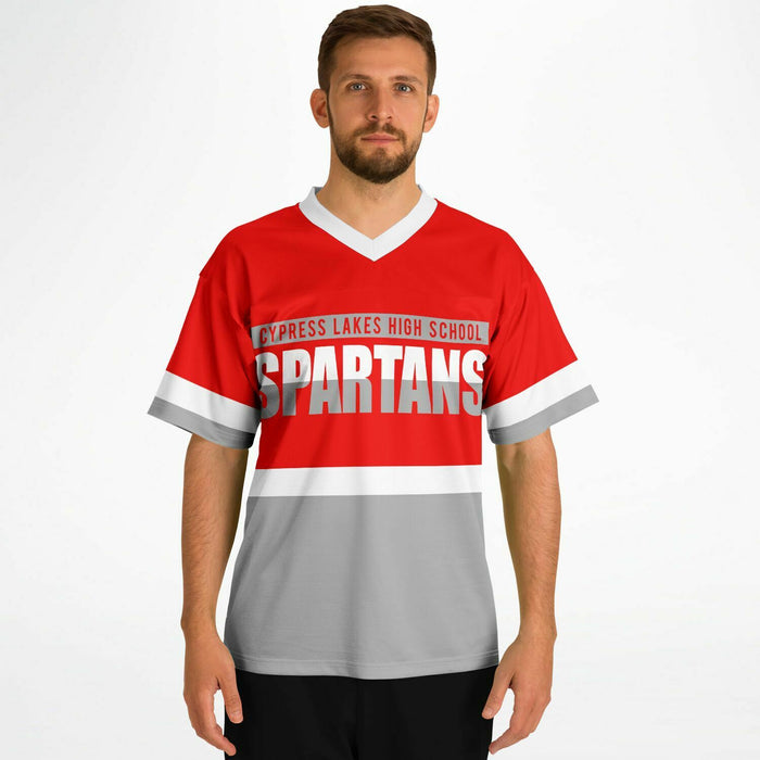 Man wearing Cypress Lakes Spartans football jersey