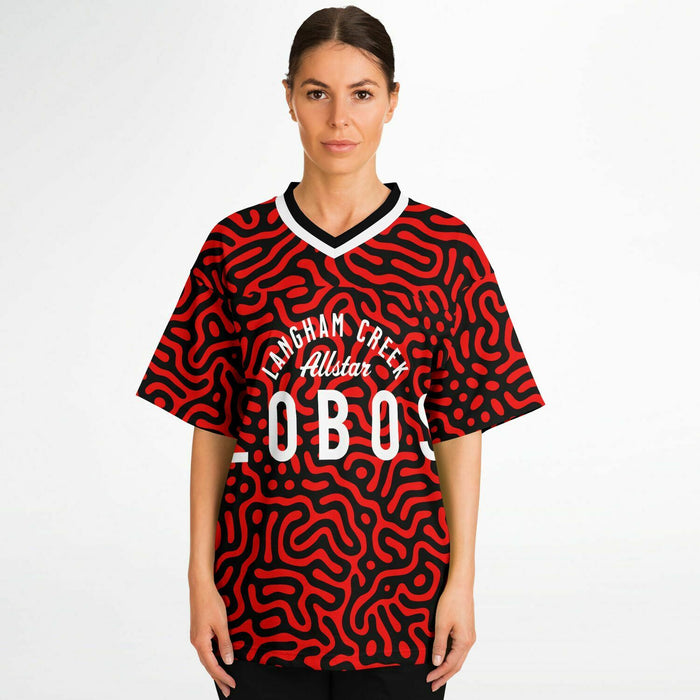 Women wearing Langham Creek Lobos football jersey