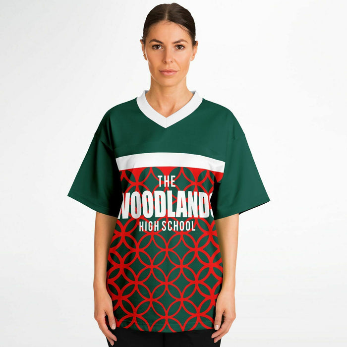 Women wearing The Woodlands Highlanders High School football jersey