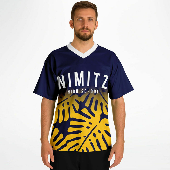 Man wearing Nimitz Cougars High School football jersey