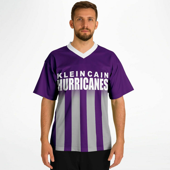 Man wearing Klein Cain Hurricanes football jersey