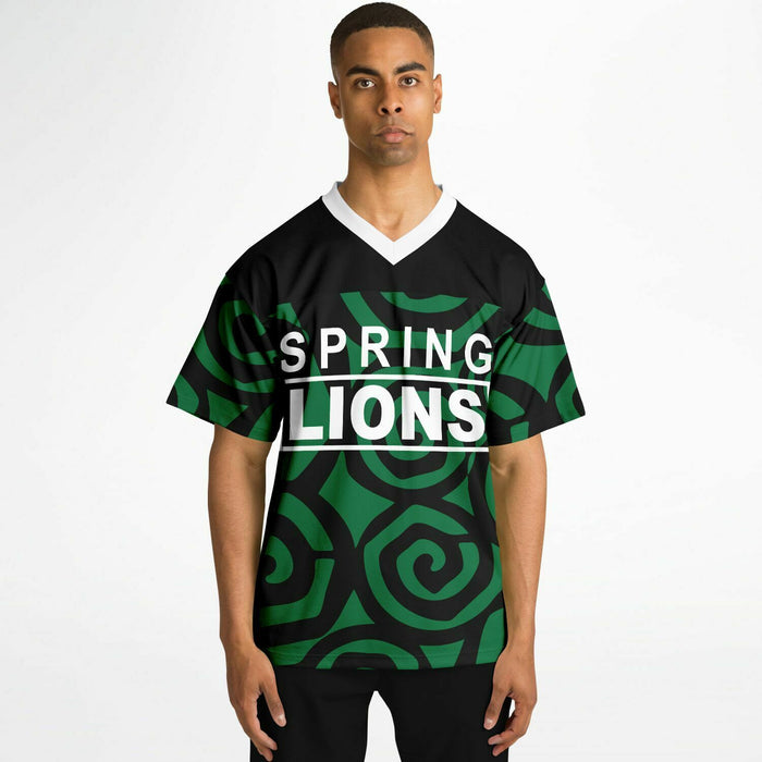 Black man wearing Spring Lions High School football Jersey