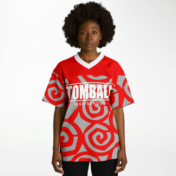 Black woman wearing Tomball Cougars High School football Jersey