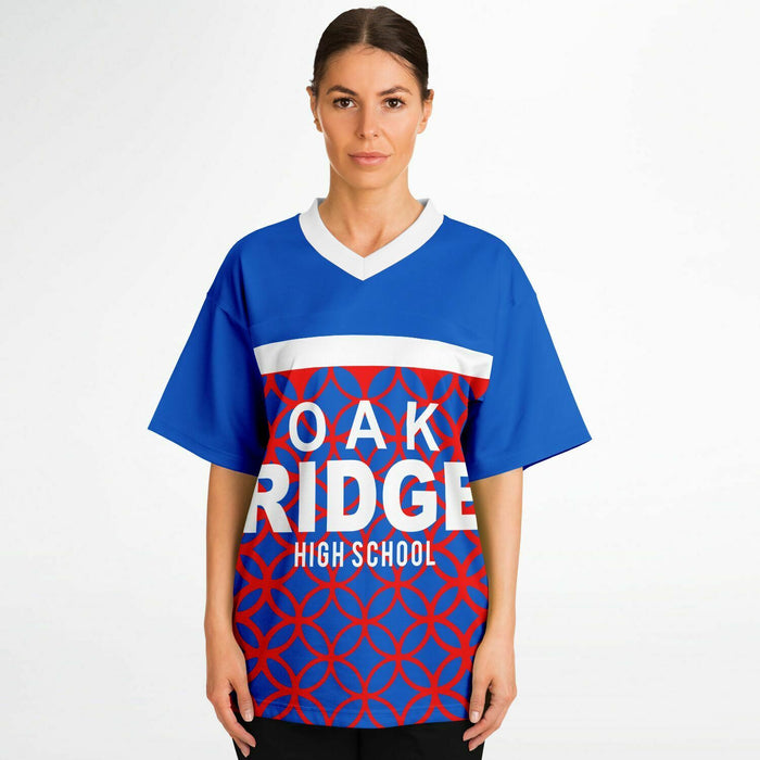 Women wearing Oak Ridge War Eagles High School football jersey