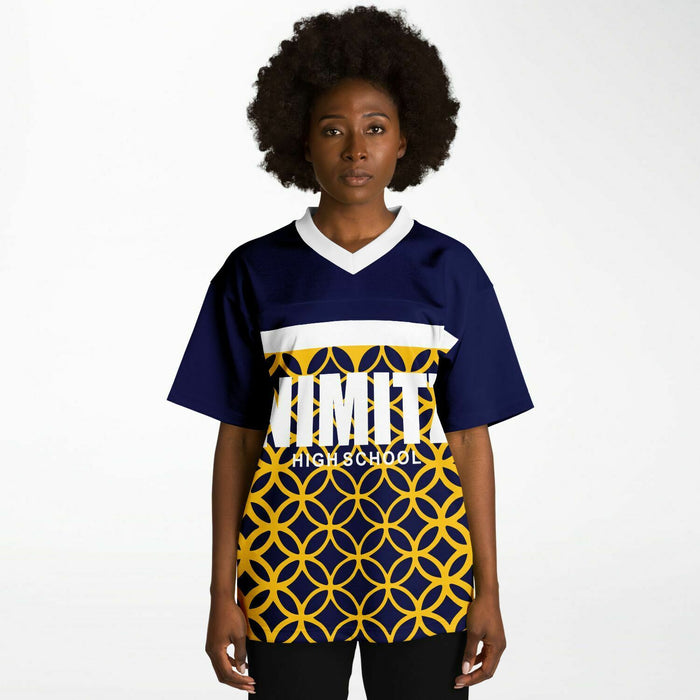 Black woman wearing Nimitz Cougars High School football Jersey