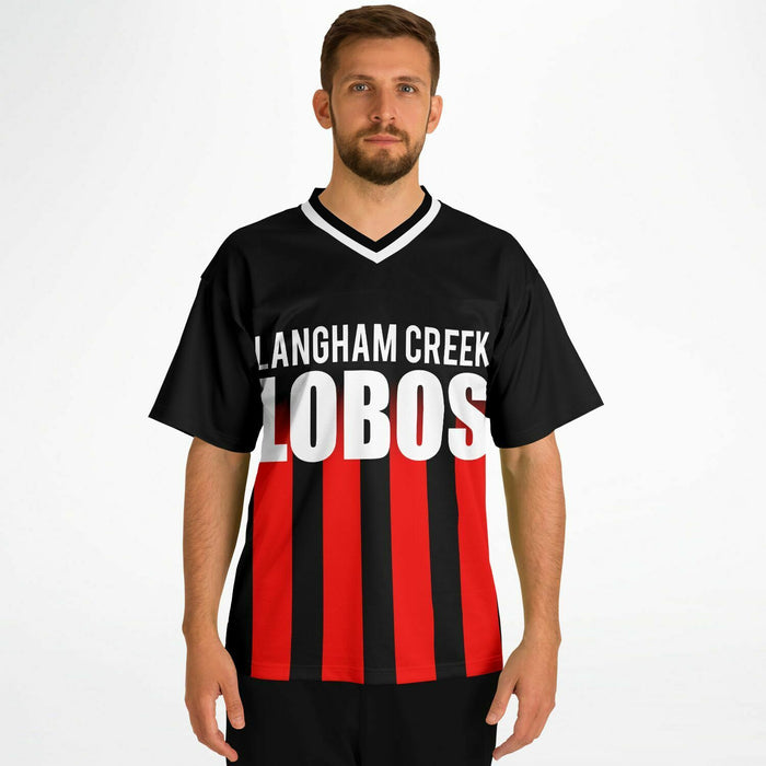 Man wearing Langham Creek Lobos football jersey